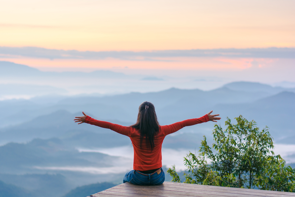 Happy,Traveler,On,Mountain,Summit,Hands,Raised,Travel,Lifestyle,Freedom